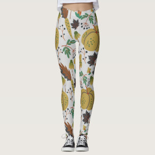 Seamless pattern of tropical pumpkins and carrots leggings