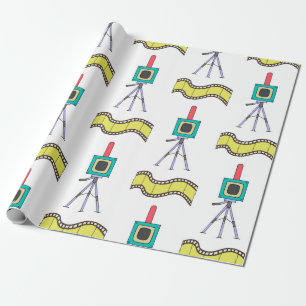 Seamless pattern with cameras and film strips on a wrapping paper