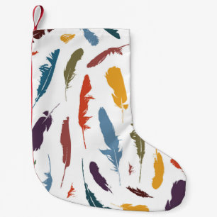 Seamless pattern with colored feathers on a light. small christmas stocking
