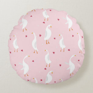 Seamless pattern with cute duck with heart on pink round cushion