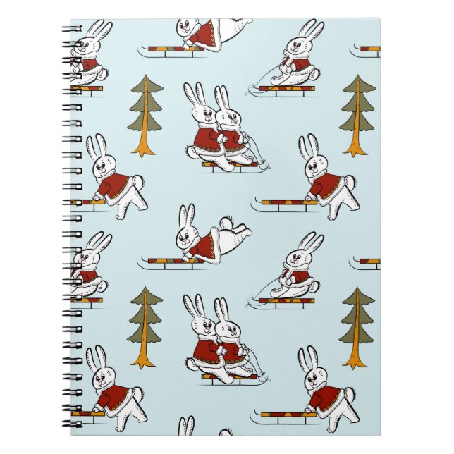 Seamless pattern with different rabbits on sleds i notebook (Front)