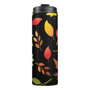 Seamless pattern with fallen autumn leaves and col thermal tumbler