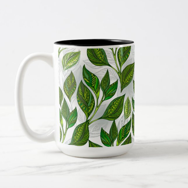 Seamless Pattern with Green Tea Leaves Two-Tone Coffee Mug (Left)