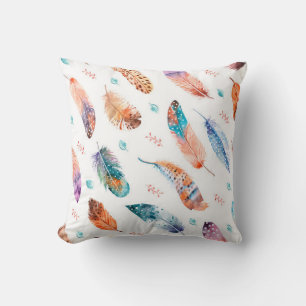 Seamless pattern with hand drawn feathers on white cushion