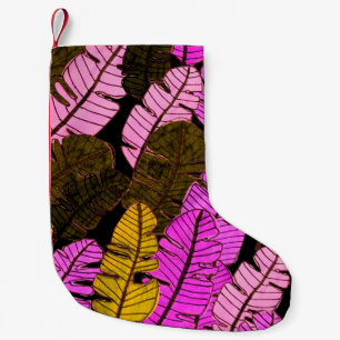 Seamless pattern with hand drawn tropical leaves.  small christmas stocking