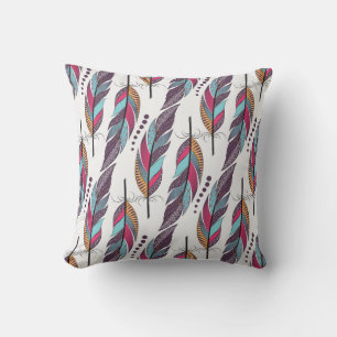 Seamless pattern with large colored feathers and d cushion