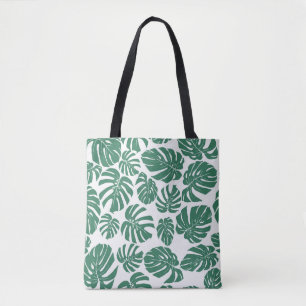 Seamless pattern with leaves of Monstera. Decorati Tote Bag