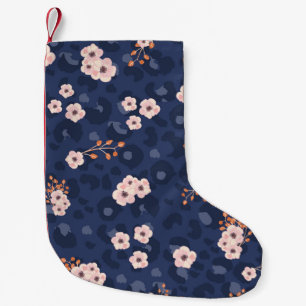 Seamless pattern with leopard skin and pink small  christmas stocking