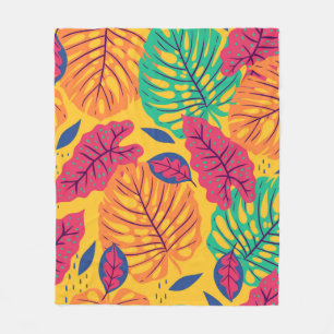 Seamless pattern with tropical leaves on yellow ba fleece blanket