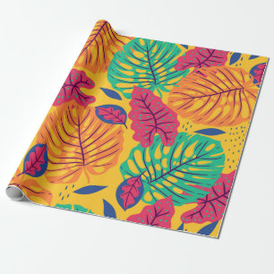 Seamless pattern with tropical leaves on yellow ba wrapping paper
