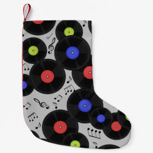 Seamless pattern with vinyl records and notes.  small christmas stocking