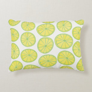 Seamless pattern with yellow lemon slices on white decorative cushion