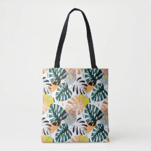 Seamless tropical pattern. Green leaves of a palm  Tote Bag