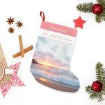 Seas And Greetings California Sunset Small Christmas Stocking<br><div class="desc">"Seas And Greeting" script at top.  It's a cute Christmas,  nautical saying over a Monterey California beach sunset photographic scene.  Pink skies and waves crashing ashore.  Template for name at top in pink area.</div>