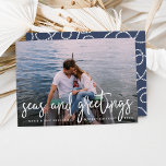 Seas and Greetings | Nautical Holiday Photo Card<br><div class="desc">Send holiday greetings to friends and family in nautical style with these coastal chic holiday photo cards. Design features your favourite photo with "seas and greetings" overlaid in white hand sketched lettering. Personalise with your names, custom greeting (shown with "Merry Christmas") and the year. Cards reverse to a white nautical...</div>