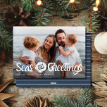 Seas & Greetings Family Photo Christmas Card<br><div class="desc">Celebrate the holiday season with a coastal twist using our Seas & Greetings Family Photo Christmas Card! This charming card features a beautiful design that showcases your favourite family photo, complemented by elegant seashell accents that evoke the tranquillity of the beach. Design Highlights: Personalised Touch: Make it uniquely yours by...</div>