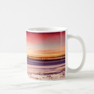 Seascape and pier at sunset, CA Coffee Mug