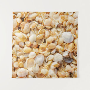 Seashell textured summer beach background. tapestry