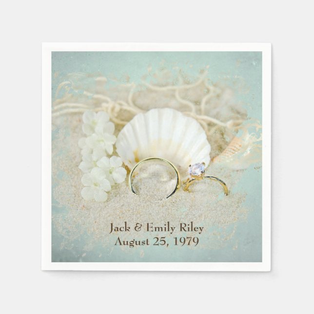 seashells and wedding rings in sand napkin (Front)