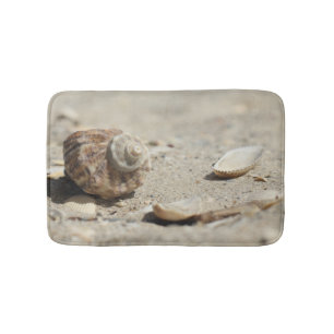 Seashells On Sand By The Sea Bath Mat