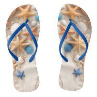 Seashells, starfish, and pebbles on a sandy beach