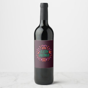 Season greetings in green handwriting with hearts wine label