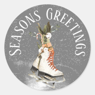 SEASONS GREETING WINTER SCENE WITH ICE SKATES CLASSIC ROUND STICKER