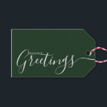 Season's Greetings Green White Minimalist Gift Tags<br><div class="desc">This minimalist and elegant gift tag features white Season's Greetings text on the front side and on the back side personalise it with your name or family name. The background is in green colour.</div>