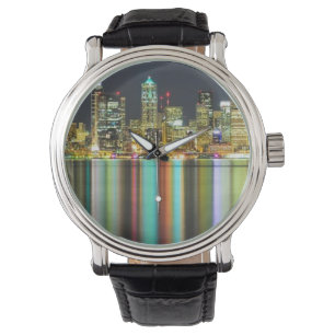 Seattle skyline at night with reflection watch
