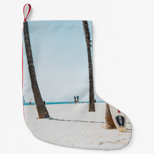 Selective focus photography of white surfboard small christmas stocking