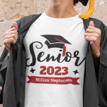 Senior class of 2023 graduation year naming T-Shirt<br><div class="desc">Celebrate your senior and graduation year with this modern t-shirt featuring a contemporary "Senior 2023" typography in black and red decorated with a black graduate cap with a red tassel; easily customise this t-shirt with your graduation year and name by editing the template fields. This t-shirt is part of our...</div>