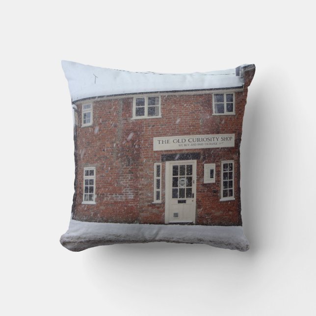 sepia photo of the old curiosity shop in snow cushion (Front)