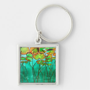 serene green pond with lilypads key ring