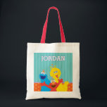 Sesame Pals Birthday Party Tote Bag<br><div class="desc">Bring the sunny days of Sesame Street straight to your little one's celebration! This adorable, custom tote features the beloved trio—Elmo, Cookie Monster, and Big Bird—all decked out in festive hats and ready to party. Perfect for carrying toys, library books, or overnight gear, this bag truly shines as the ultimate...</div>