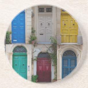 Set of colourful front doors in Malta Coaster