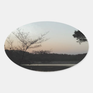 Setting Sun, Rising Moon  over  Lake Arrowhead Oval Sticker