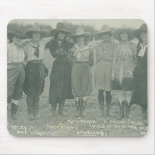 Seven rodeo cowgirls posing for a photograph. mouse mat