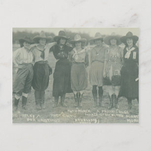 Seven rodeo cowgirls posing for a photograph. postcard