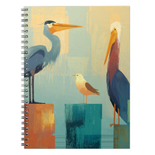 Several seabirds perched on pilings notebook