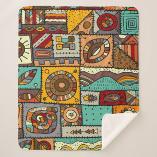 Sewn pieces of fabric in a patchwork style. Ethnic Sherpa Blanket