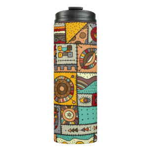 Sewn pieces of fabric in a patchwork style. Ethnic Thermal Tumbler