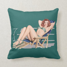 Sexy redhead pinup girl in green bikini