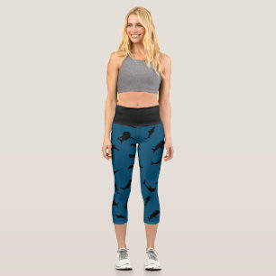 shadow fish shark whale on gradient blue Ocean Capri Leggings