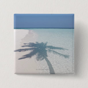 Shadow of a palm tree on a deserted island beach 15 cm square badge