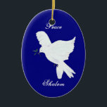 Shalom-White Peace Dove Ornament<br><div class="desc">This beautiful symbol of peace,  a white dove and the words Shalom,  and Peace will be a fine addition to your keepsake ornaments this year.  The reverse side also has the dove with deep blue background,  and the year,  which can be customised.</div>
