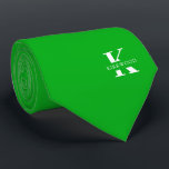 Shamrock Green Elegant Monogram   Name One-Sided Tie<br><div class="desc">An elegant necktie featuring a bold white monogram across a Shamrock Green background. On top of this monogram sits your first or last name spelled out in all capitals. If you prefer a bolder look for the personal name inside of the large letter you can do the following: Use the...</div>