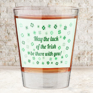 Shamrocks 4-leafed clovers on light green shot glass