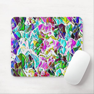 Shape of coloured and shiny stones dipped in milk mouse mat