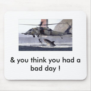 Shark attacks helicopter. mouse mat