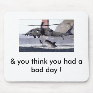 Shark attacks helicopter. mouse mat